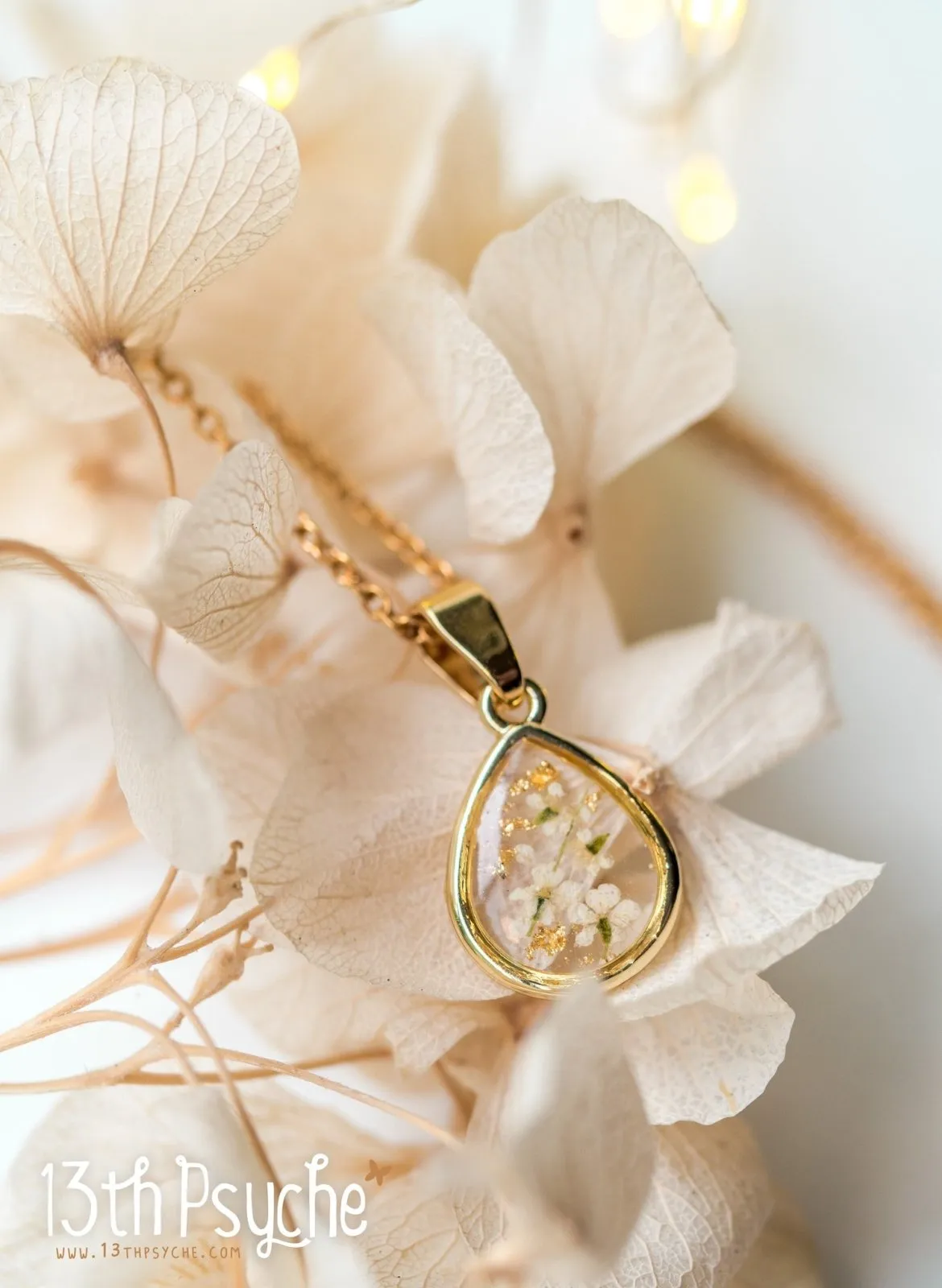Dried white flowers and gold flakes resin teardrop pendant necklace