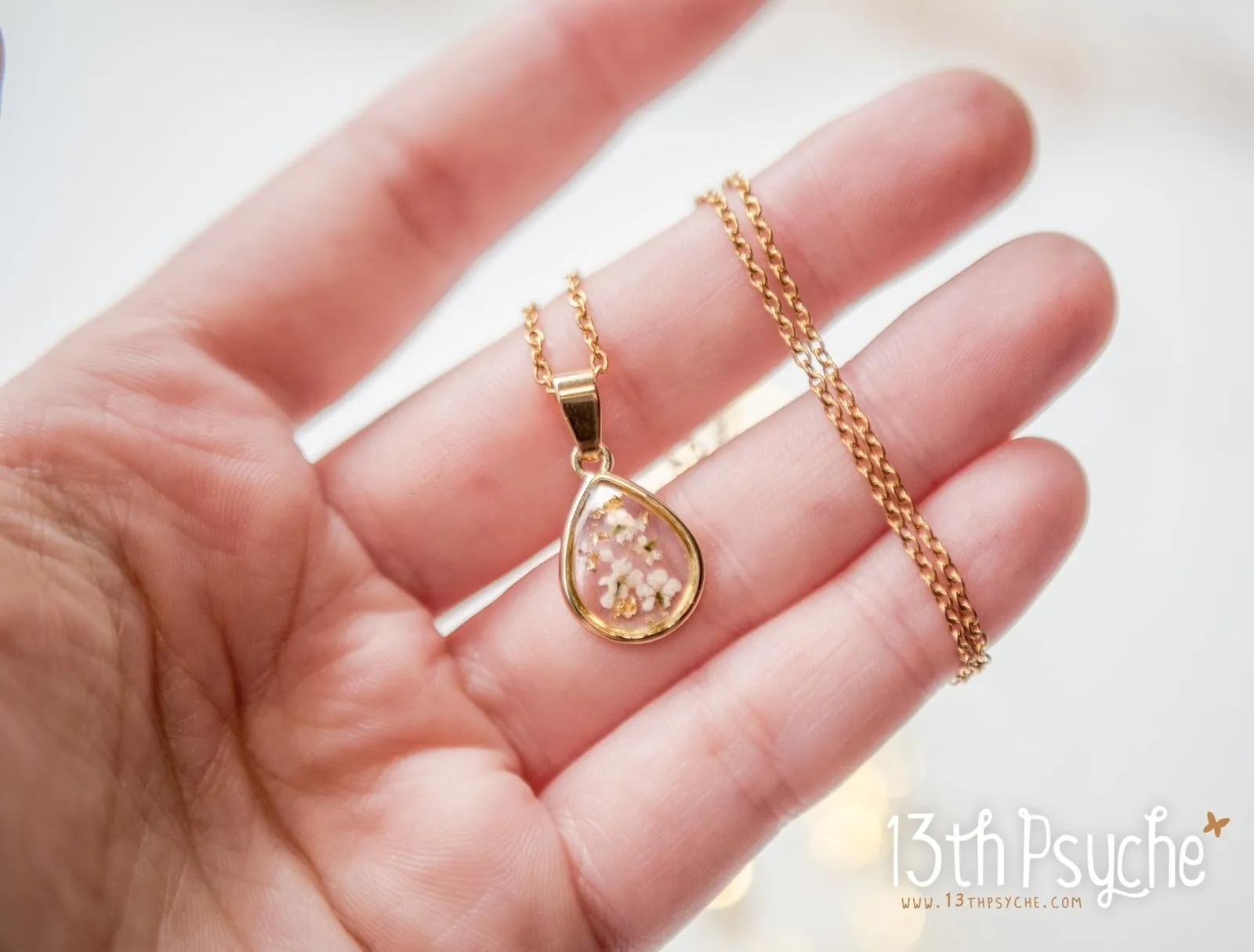 Dried white flowers and gold flakes resin teardrop pendant necklace